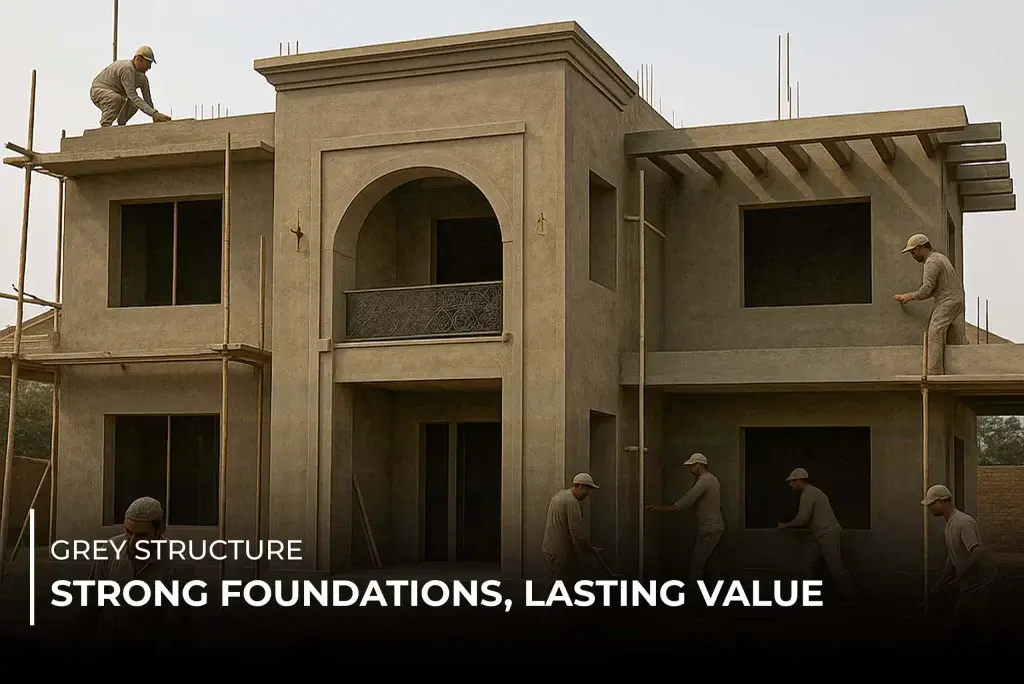 Grey structure house under construction with workers finishing concrete walls and roof – strong foundations and lasting value for real estate investment.